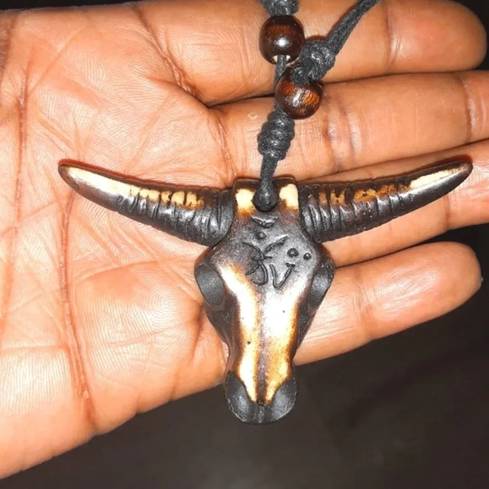 Hand CRAFTED UNISEX brown bull head pendant with adjustable necklace